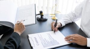 stockphotoscom-1915428 libra scale and hammer on the table-small